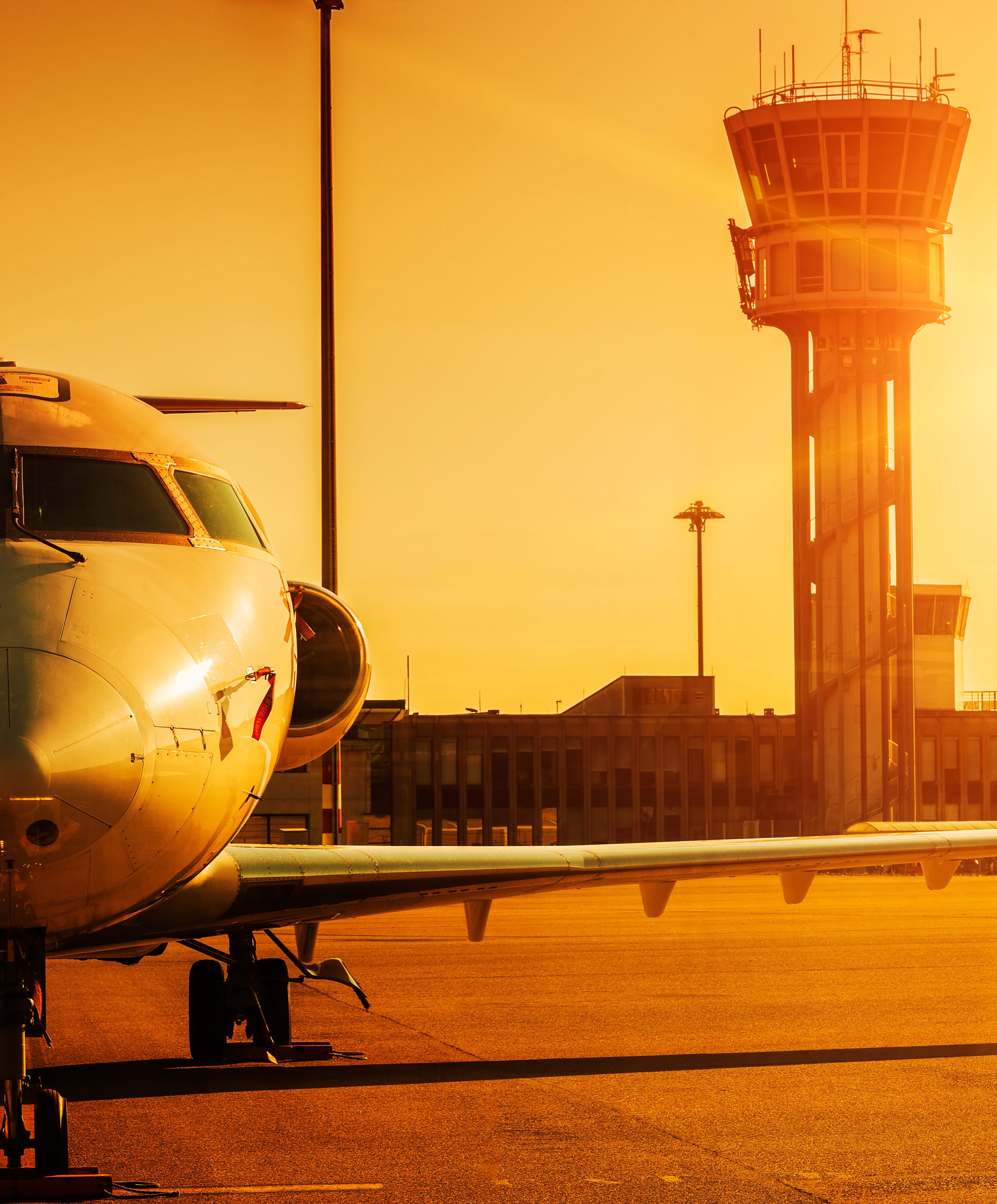 plane-at-airport-in-sunsetba.jpg